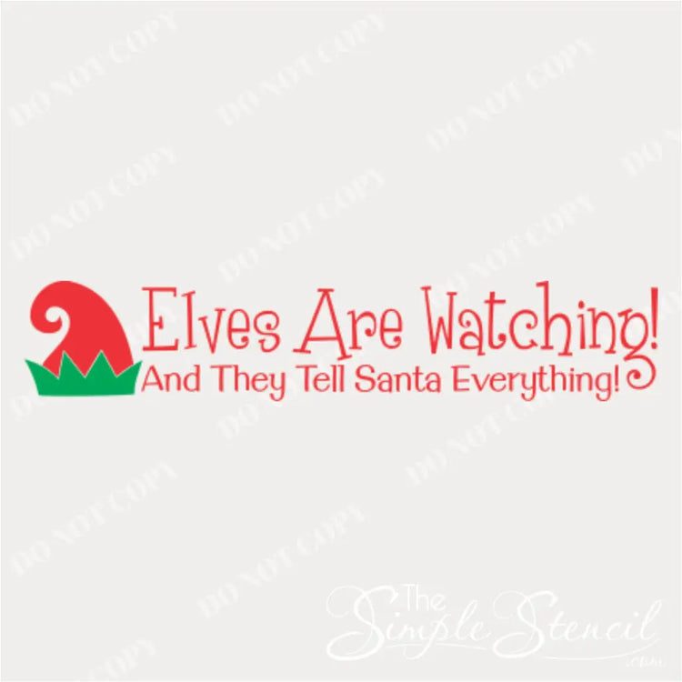 Christmas vinyl wall decal design that reads: Elves Are Watching! And They Tell Santa Everything! next to a red and green elf hat graphic. The design is in red and green on a white background.
