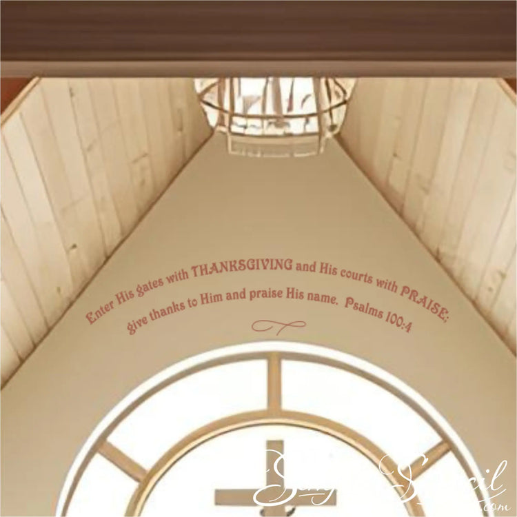 Detail shot of the Psalm 100:4 arched decal applied to a curved ceiling arch in a church, demonstrating perfect fit for unique church architecture.