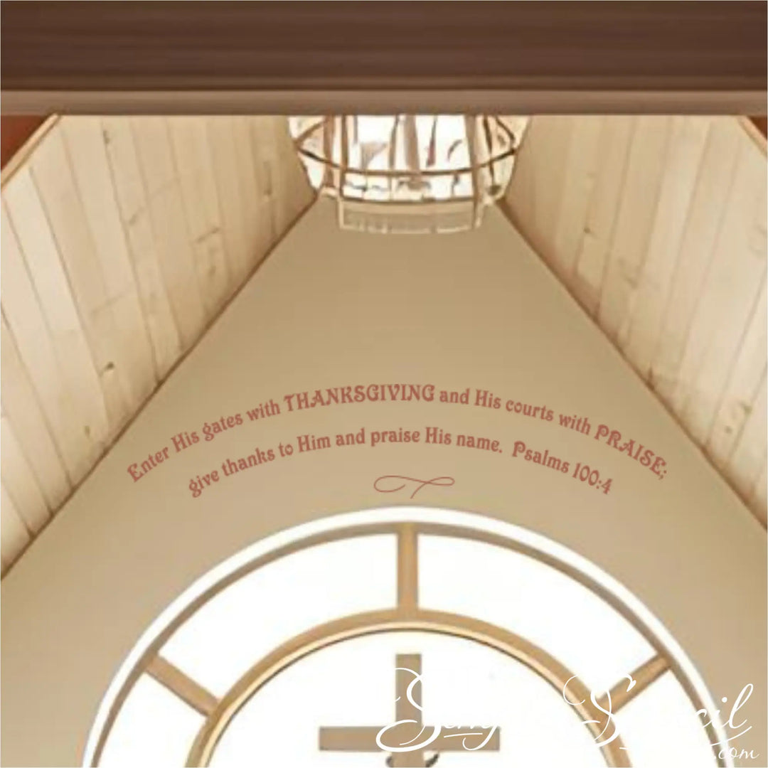 Detail shot of the Psalm 100:4 arched decal applied to a curved ceiling arch in a church, demonstrating perfect fit for unique church architecture.