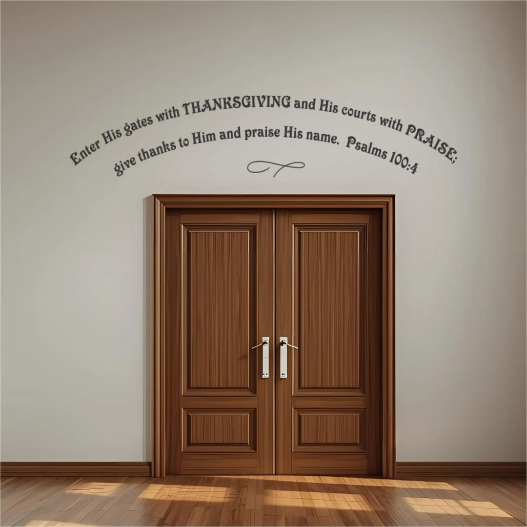 Dark gray vinyl lettering decal reading 'Enter His gates with Thanksgiving' (Psalm 100:4) in an arched format placed high above large wooden double doors. Excellent church entryway decor and inspirational wall quote.