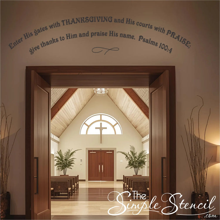Dark Brown religious vinyl lettering arched over the main entrance of a church hall with pews and a cross window visible. Shows a large-format church wall decal welcoming the church congregation.