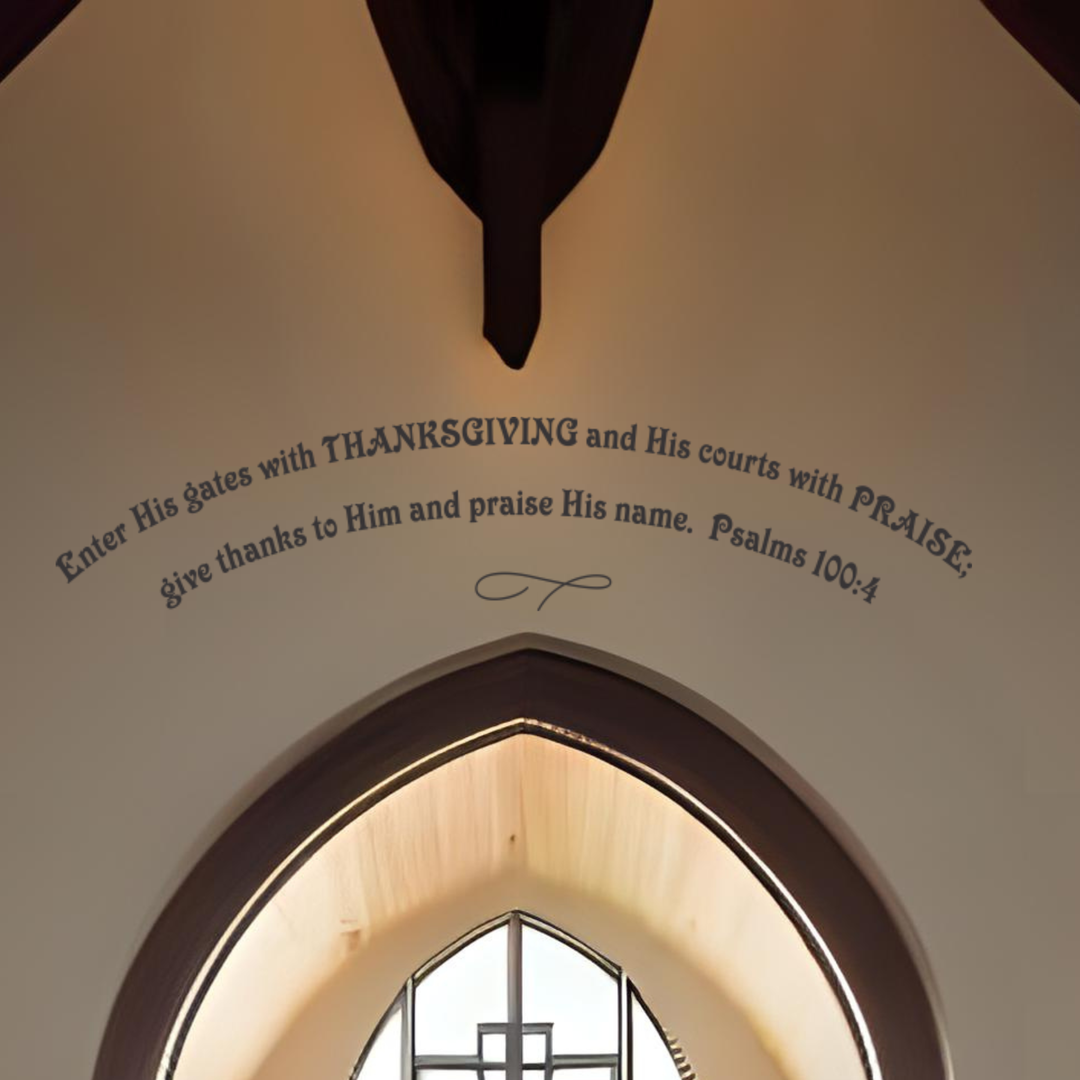 Close-up of a blush-colored scripture quote decal arched high on a church wall above a circular window and cross. Features the full text of Psalms 100:4 as powerful Thanksgiving religious decor.