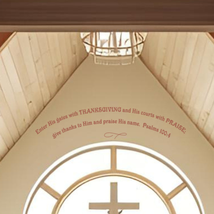 Detail shot of the Psalm 100:4 arched decal applied to a curved ceiling arch in a church, demonstrating perfect fit for unique church architecture.