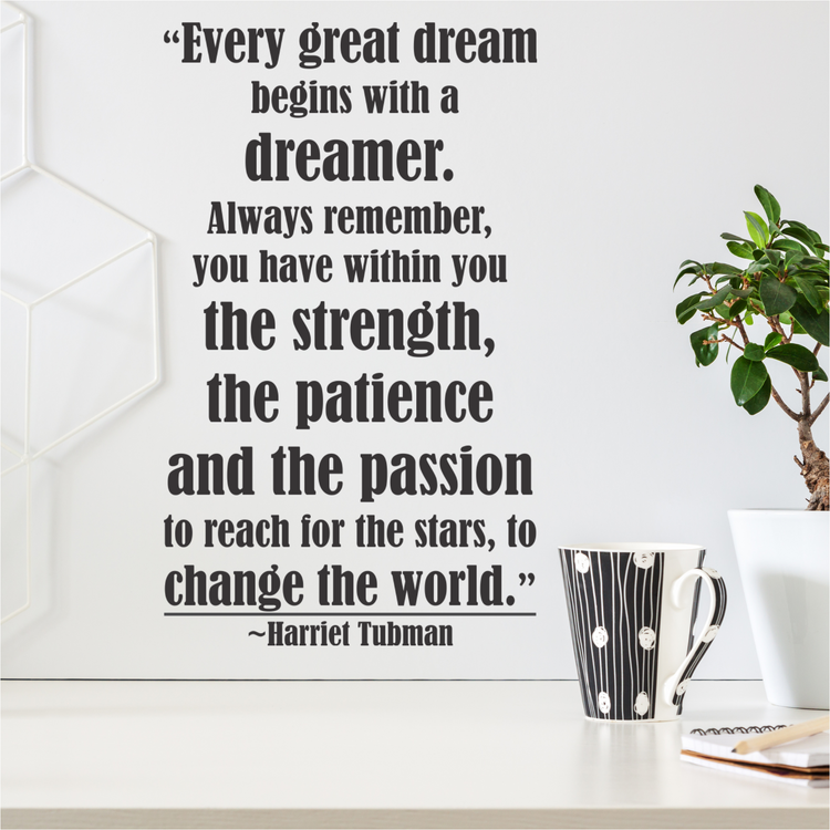 Harriet Tubman Every great dream begins with a dreamer quote decal on a wall above a desk for Black History Month