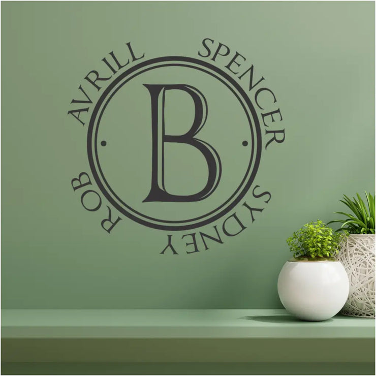 Family Initial with family members first names circling is a great wall decal to display in a family gathering room or playroom. Many sizes and beautiful colors available at The Simple Stencil