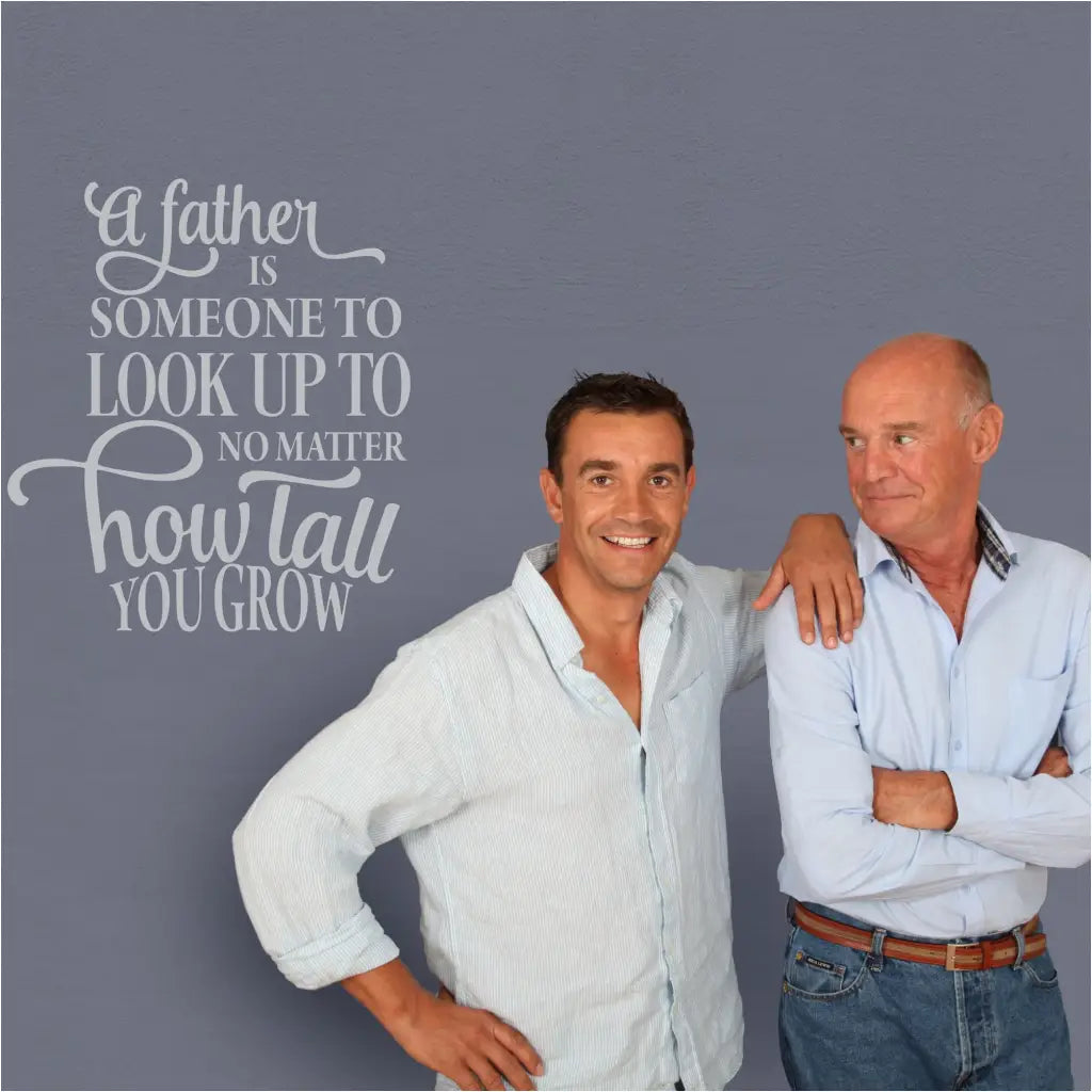 A father is someone to look up to no matter how tall you grow. A vinyl wall decal display for a great Father's day photo! By TheSimpleStencil.com