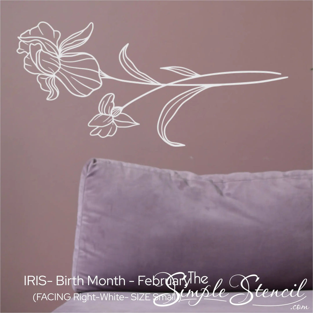 A small white Iris wall silhouette applied horizontally above a soft purple velvet sofa for a peaceful, modern contrast.
