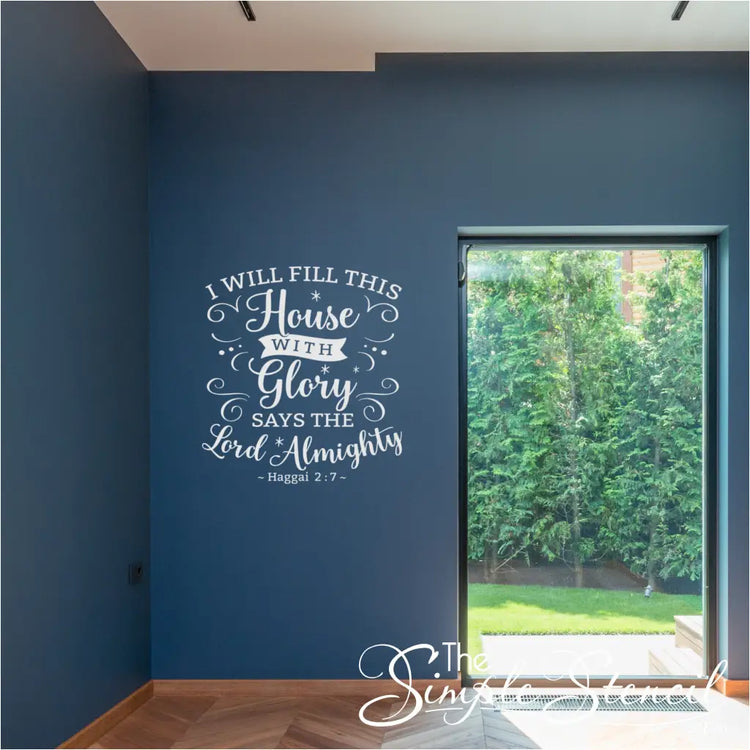 Vinyl wall decal with the Bible verse Haggai 2:7 applied to a church wall.