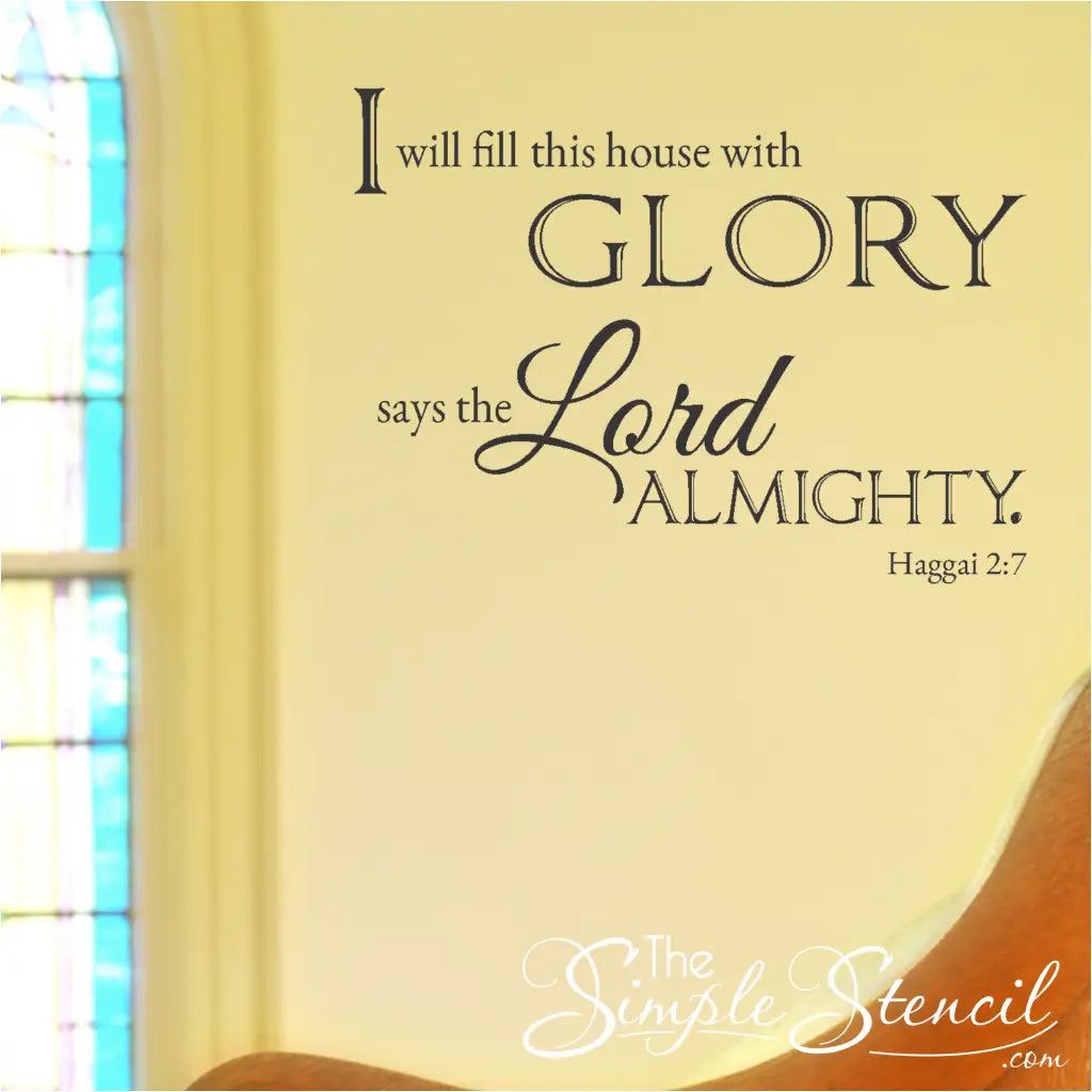 The "I Will Fill This House With Glory" wall decal displayed above the altar in a church sanctuary, bathed in soft lighting.