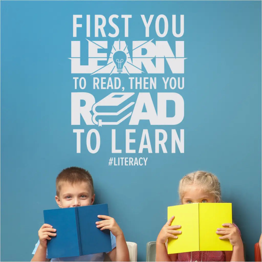 "First you learn to read, then you read to learn" wall decal on a library wall.