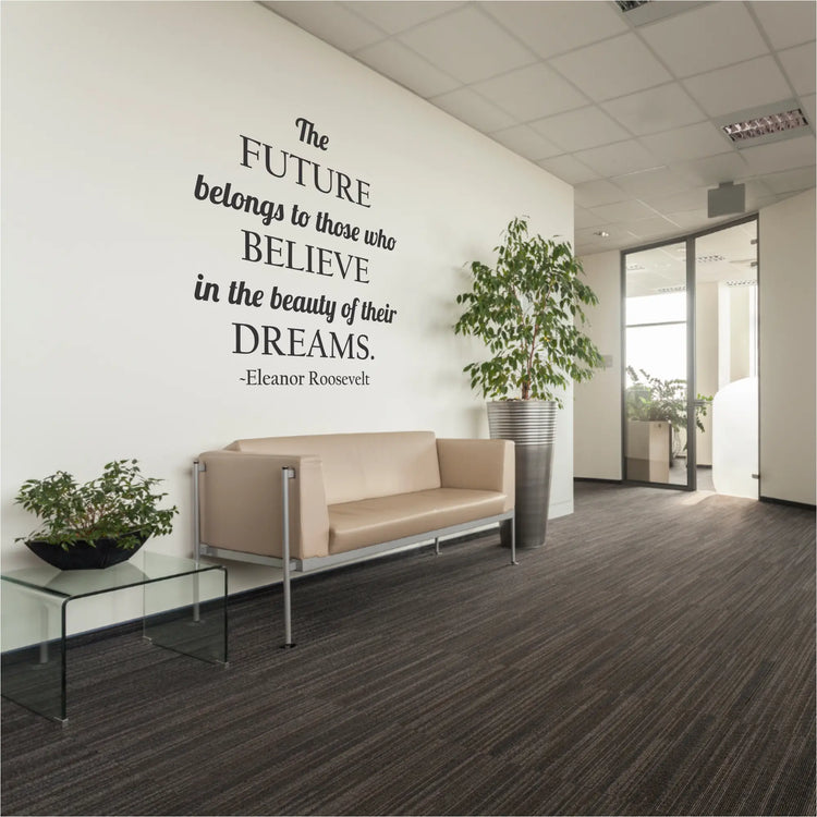 A motivational classroom quote for highschool or business office settings that reads: The future belongs to those who believe in the beauty of their dreams. Eleanor Roosevelt. Shown in black on a school counselors office waiting room. By The Simple Stencil