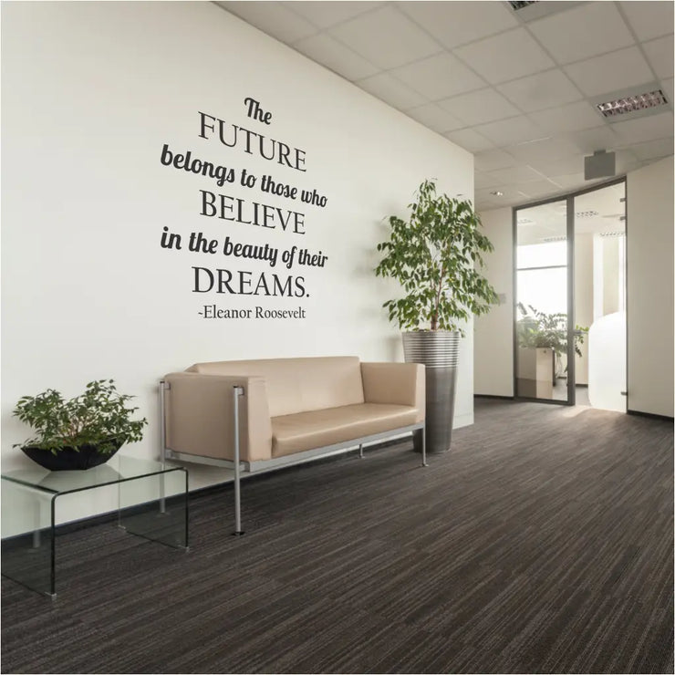 A motivational classroom quote for highschool or business office settings that reads: The future belongs to those who believe in the beauty of their dreams. Eleanor Roosevelt. Shown in black on a school counselors office waiting room. By The Simple Stencil