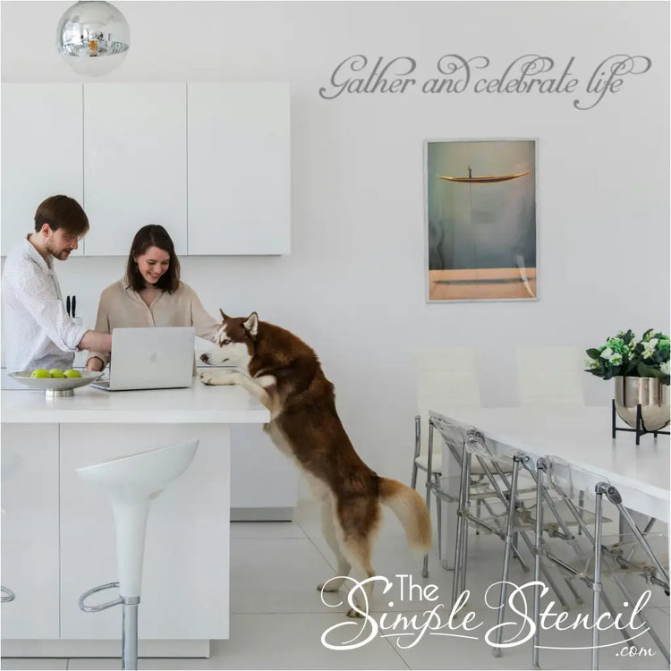Large "Gather and Celebrate Life" removable wall decal applied to a dining room wall with natural light.