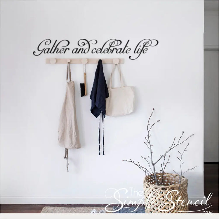 Lifestyle shot of "Gather and Celebrate Life" peel and stick wall decal enhancing a family gathering space.
