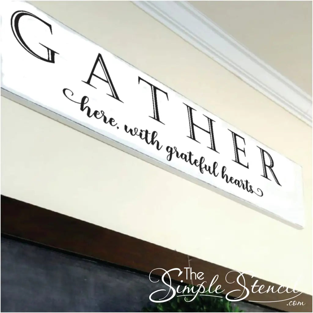 Enhance your dining room's décor with our easy-to-apply and removable "Gather here with grateful hearts" vinyl wall decal.
