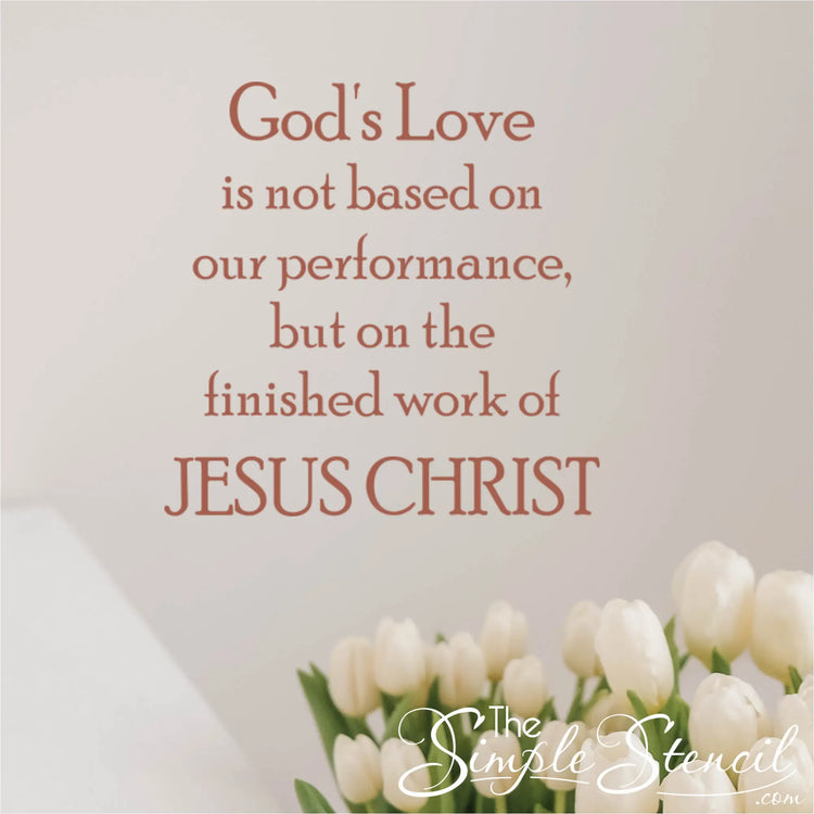 Copper 'God's Love' vinyl decal styled on a clean white wall above a bouquet of white tulips, highlighting elegant Easter morning home decorating ideas