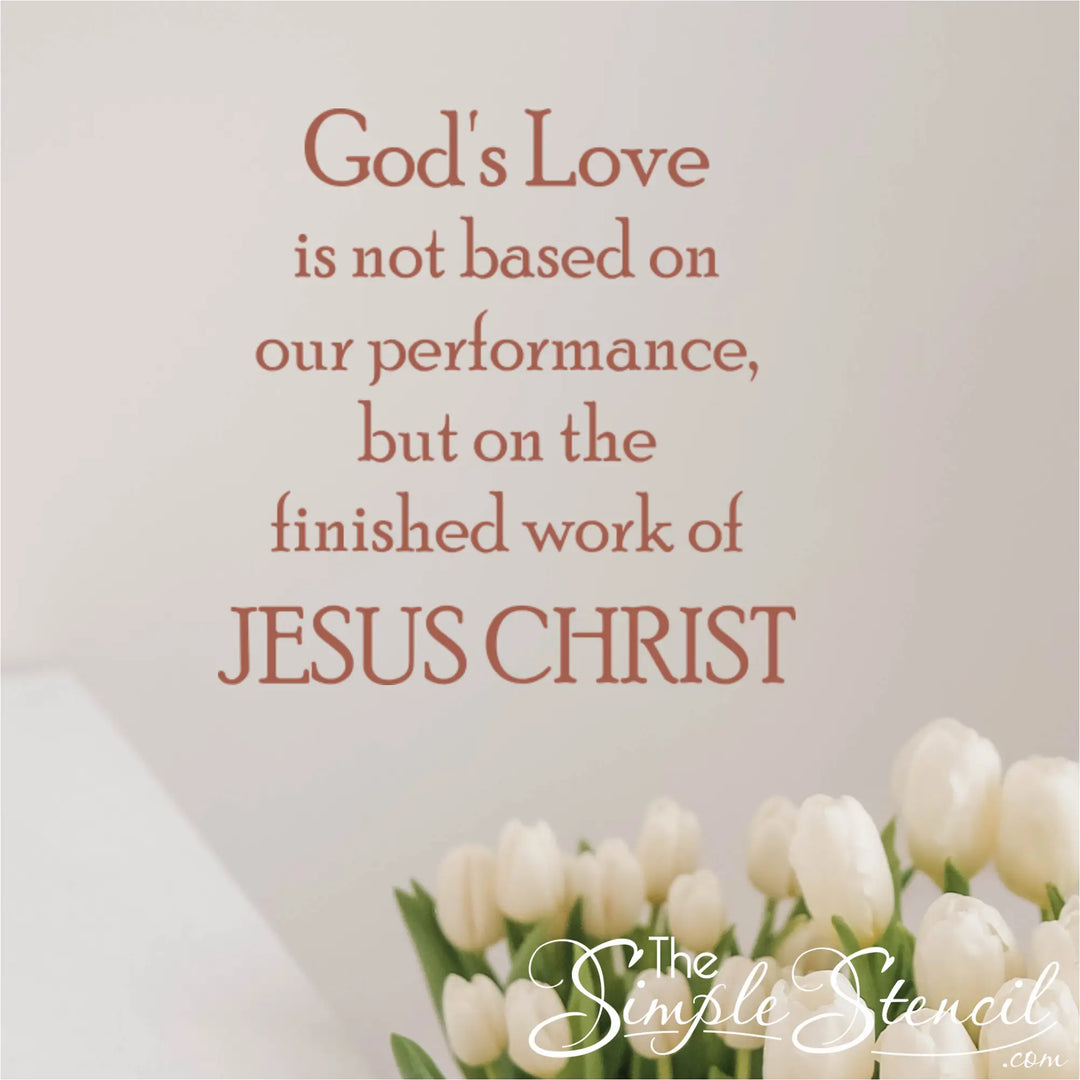 Copper 'God's Love' vinyl decal styled on a clean white wall above a bouquet of white tulips, highlighting elegant Easter morning home decorating ideas