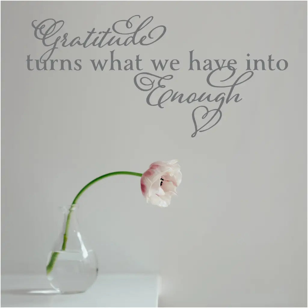 A super adorable wall decal by The Simple Stencil that reads: Gratitude turns what we have into enough.