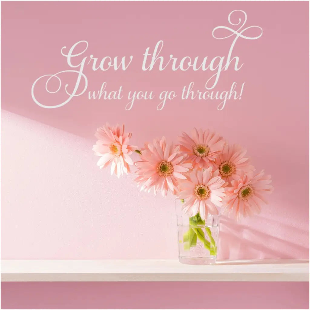 A beautifully scripted wall decal by The Simple Stencil that reads: Grow through what you go through! 