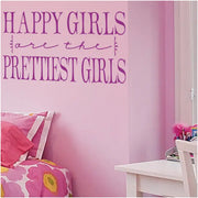 Happy Girls are the Prettiest Girls | Large vinyl wall decal displayed behind the bed in a little girl's pink room to inspire her happiness everyday!