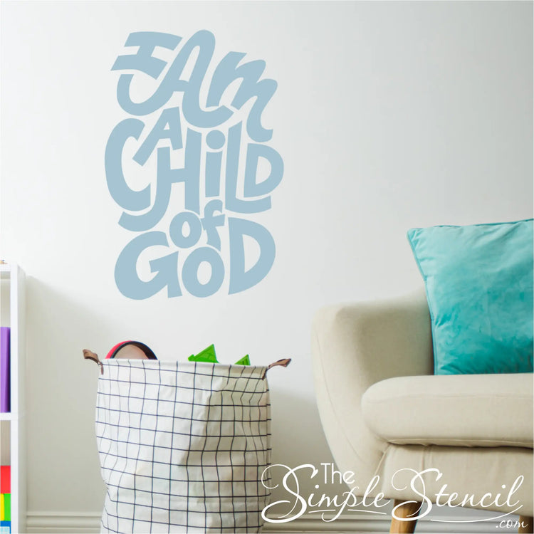 A heartwarming "I am a child of god" vinyl lettering decal adorning the wall of a peaceful infant's nursery.
