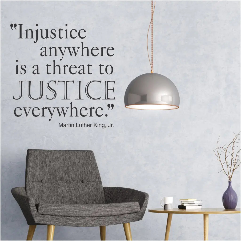 Injustice Anywhere Quote By Martin Luther King Jr. displayed on a lobby wall in black. Full wall quote by The Simple Stencil reads: Injustice anywhere is a threat to justice everywhere. Martin Luther King, Jr. 
