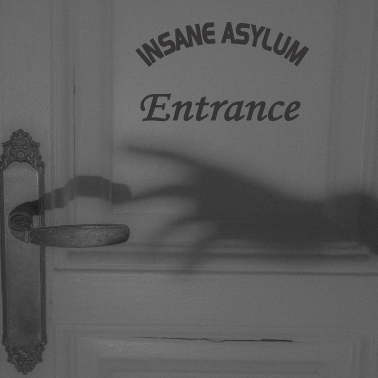 A black and white photo of an "Insane Asylum Entrance" vinyl decal on a door with a creepy shadow of a hand reaching for the doorknob.