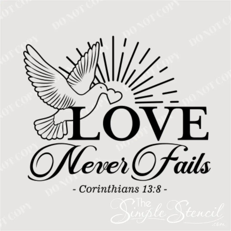 Close up wall decal picture of the bible verse Love never fails with flying dove and heart embellishment. By The Simple Stencil