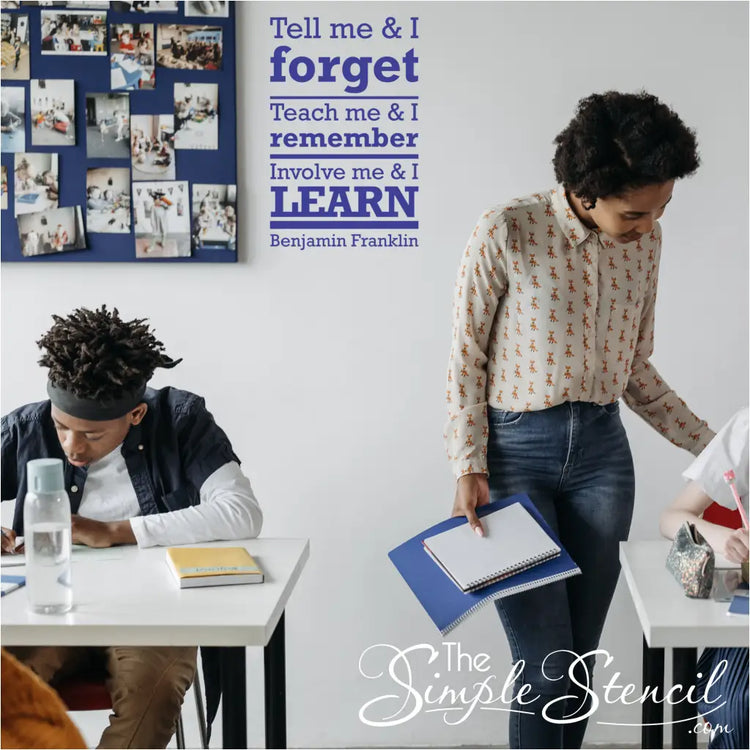 "Involve Me and I Learn" wall decal in a classroom setting.