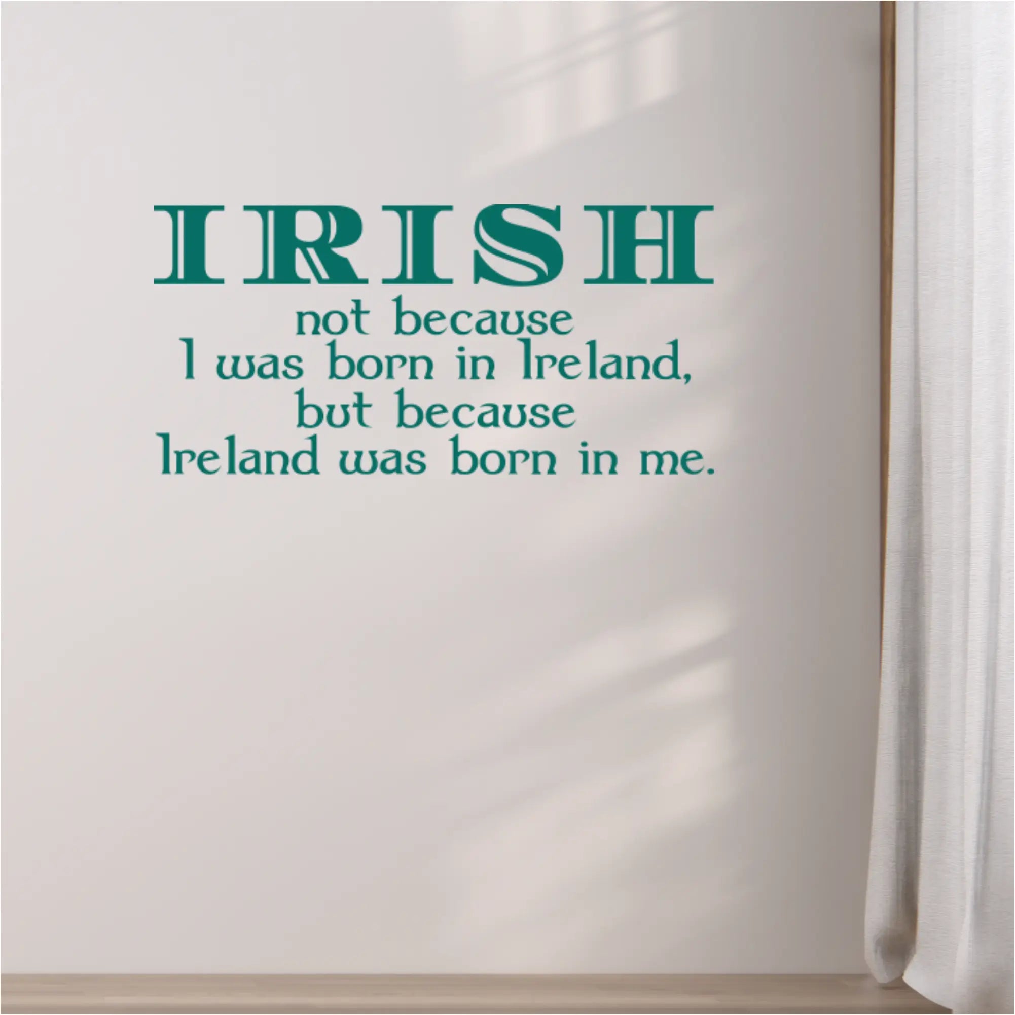 Irish heritage wall decal in forest green displayed on a clean white wall, featuring the sentimental quote 'Ireland was born in me' for year-round or St. Patrick's Day decor.