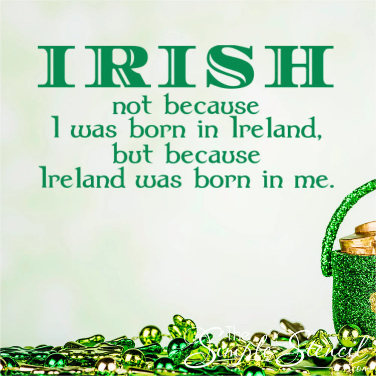 Irish-themed wall lettering styled with festive St. Patrick's Day decorations, including a green glitter pot of gold and shamrock clover garland.