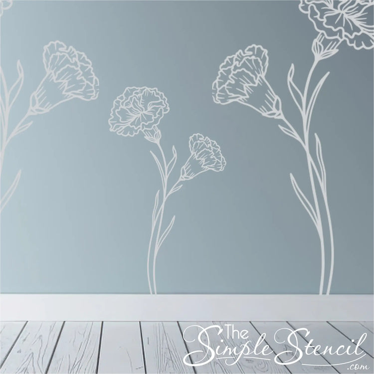 A repeat pattern of white Carnation botanical silhouettes on a soft blue wall, creating a custom mural effect.