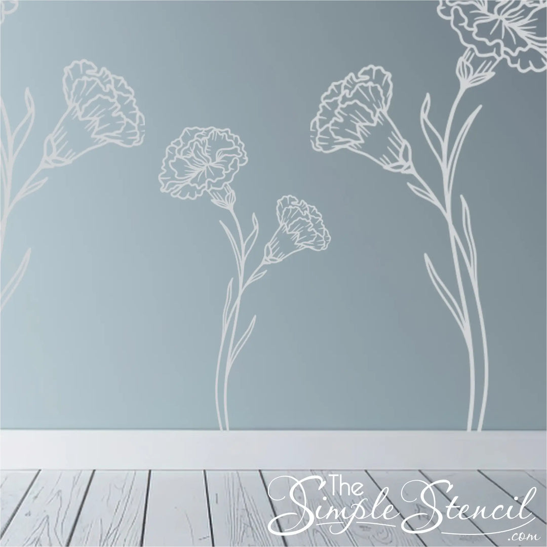 A repeat pattern of white Carnation botanical silhouettes on a soft blue wall, creating a custom mural effect.