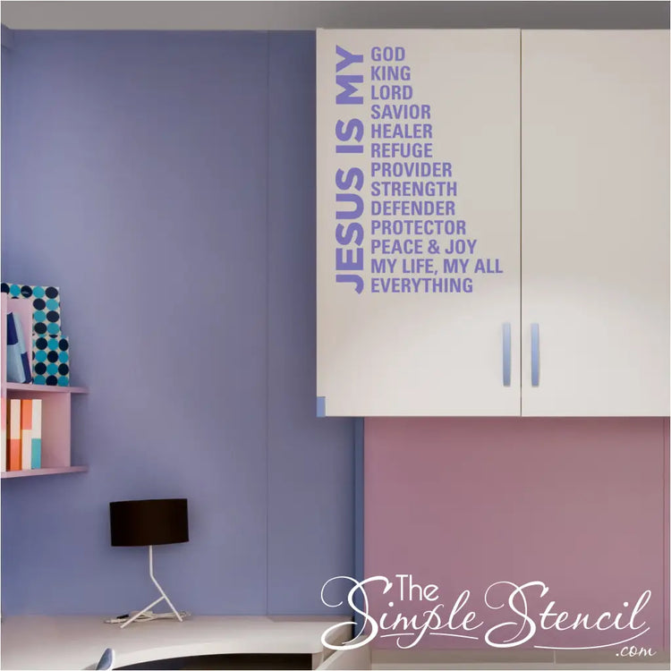 Christian home decor featuring the 'Jesus Is My Everything' vinyl sticker centered above a desk with purple acceent walls in girls room, highlighting a peaceful prayerful space.