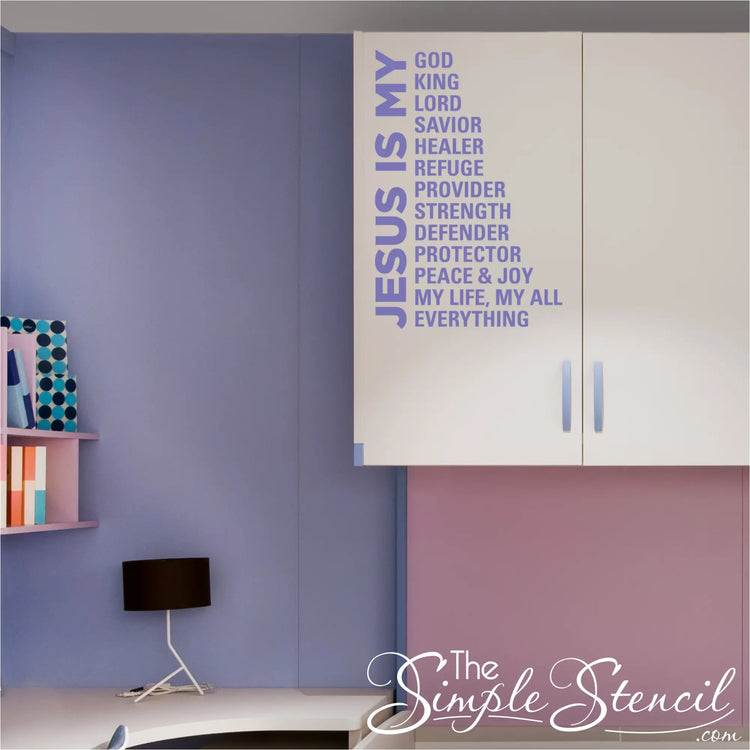 Christian home decor featuring the 'Jesus Is My Everything' vinyl sticker centered above a desk with purple acceent walls in girls room, highlighting a peaceful prayerful space.