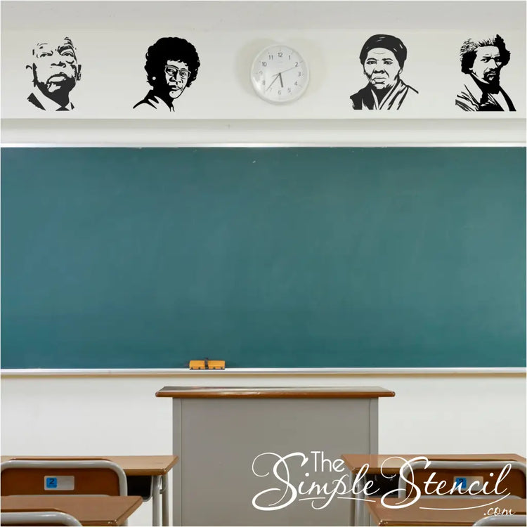 School classroom chalkboard wall decorated with a collection of vinyl silhouette decals featuring Black history icons: John Lewis, Shirley Chisholm, Harriet Tubman, and Frederick Douglass.