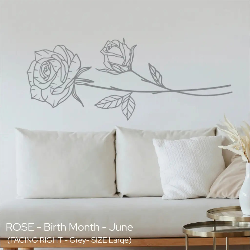 Soft grey Rose wall lettering applied horizontally above a white linen sofa for a subtle, romantic living room vibe.