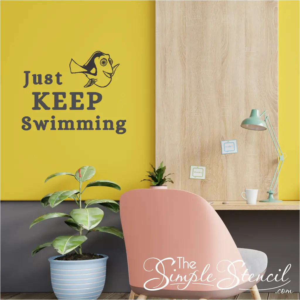  "Just Keep Swimming" wall decal applied on a yellow office wall to motivate and inspire yourself or employees. 