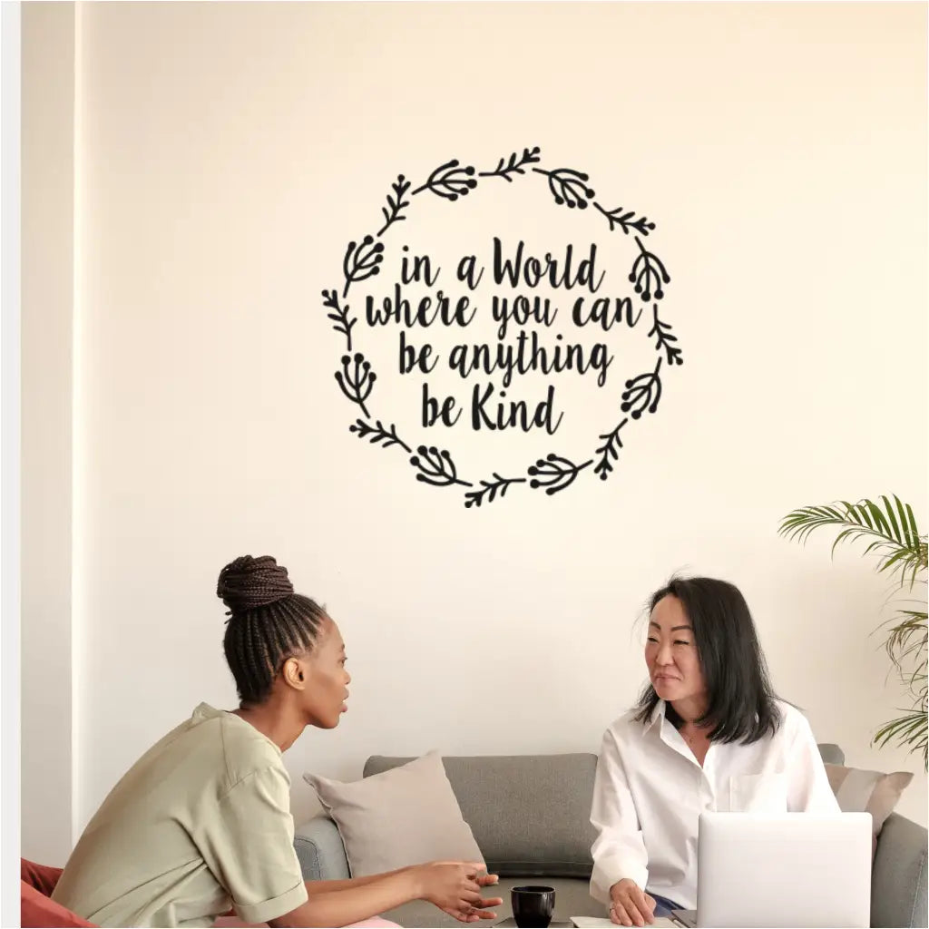 "Be Kind" wall decal with dandelion wreath in a school library, fostering a welcoming and positive atmosphere.