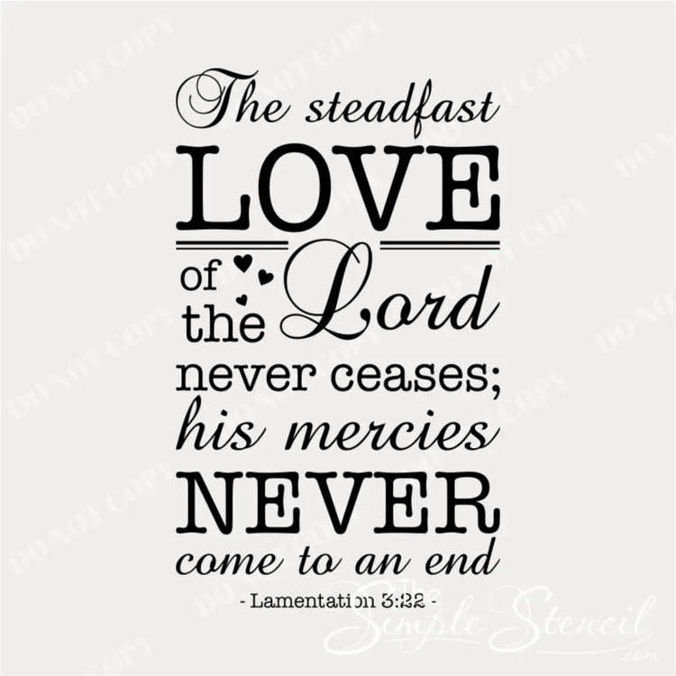 Close-up of a "The Steadfast Love of the Lord Never Ceases" vinyl wall decal applied to a living room wall, showcasing its intricate script and elegant design.