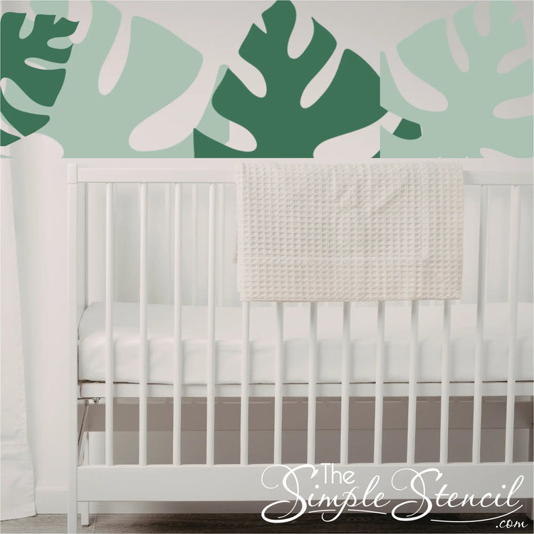 monstera-leaf-cluster-wall-decals-over-white-crib-green-shades