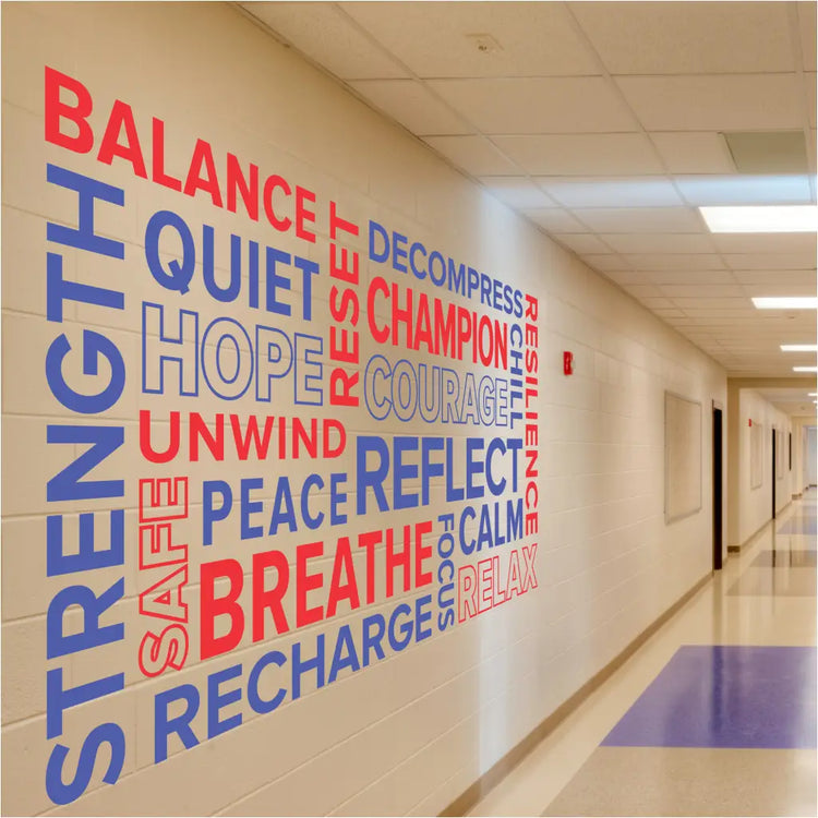 Positive affirmation word collage decal on a school hallway wall to inspire students and staff.