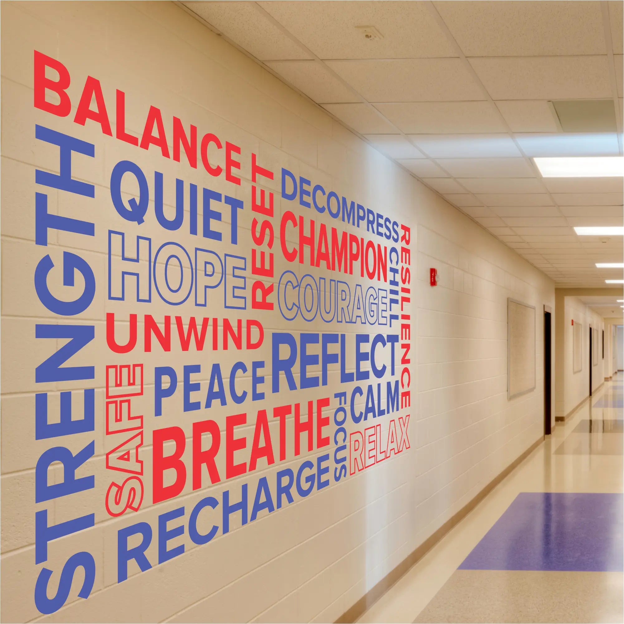Positive affirmation word collage decal on a school hallway wall to inspire students and staff.
