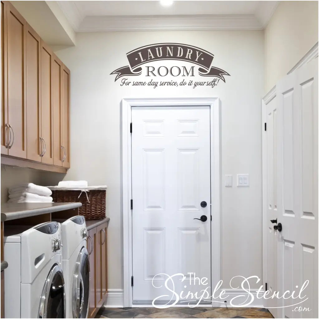 A cute laundry room wall decal displayed over the doorway  adds fun home decor to otherwise boring room!