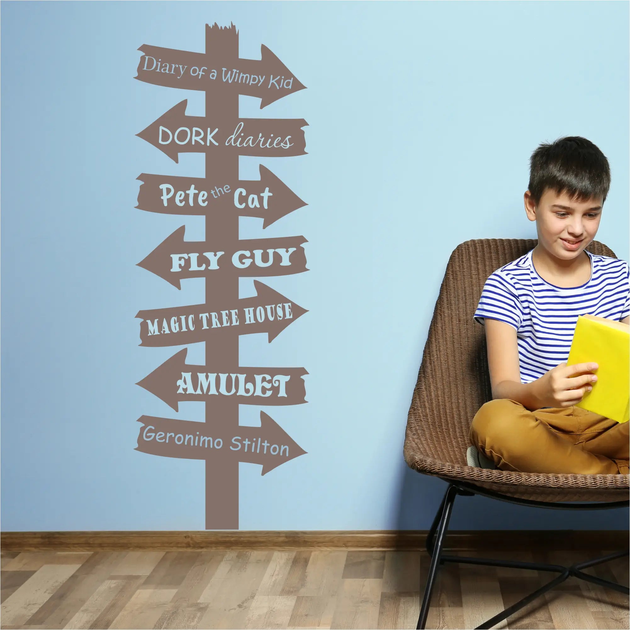 Library Book Destination Sign 2 - A collection of popular young adult books such as Diary of a Wimpy Kid, Dork Diaries, Fly Guy, etc. incorporated into this cute Library Wall Display perfect for schools or classroom reading nooks of elementary and middle school students. 