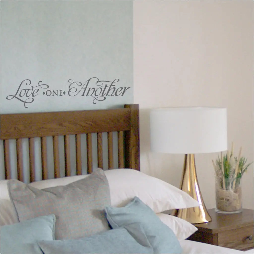 Love one another - beautifully scripted vinyl wall decal by The Simple Stencil adds a romantic touch to the decor wherever it's placed!
