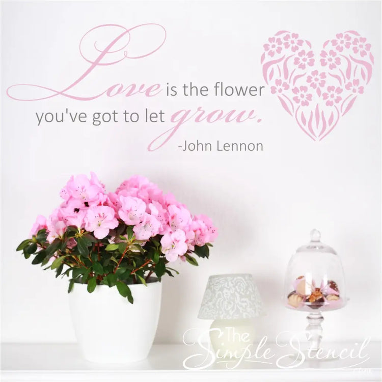 John Lennon's lyrics "Love is the flower you've got to let grow" as a beautiful vinyl wall decal to display in anywhere love is planted.