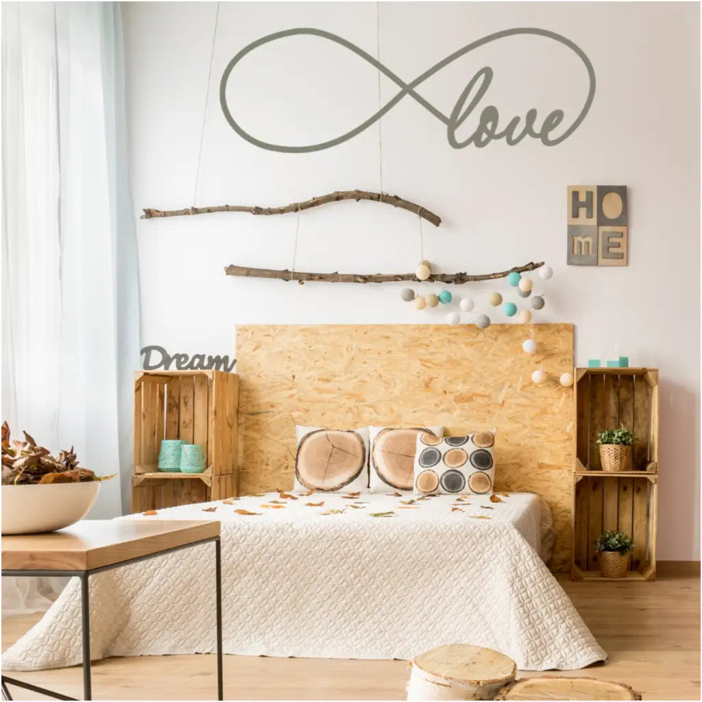 A large infinity wall decal that incorporates the word "love" into it's design to adorn walls of master bedroom. 