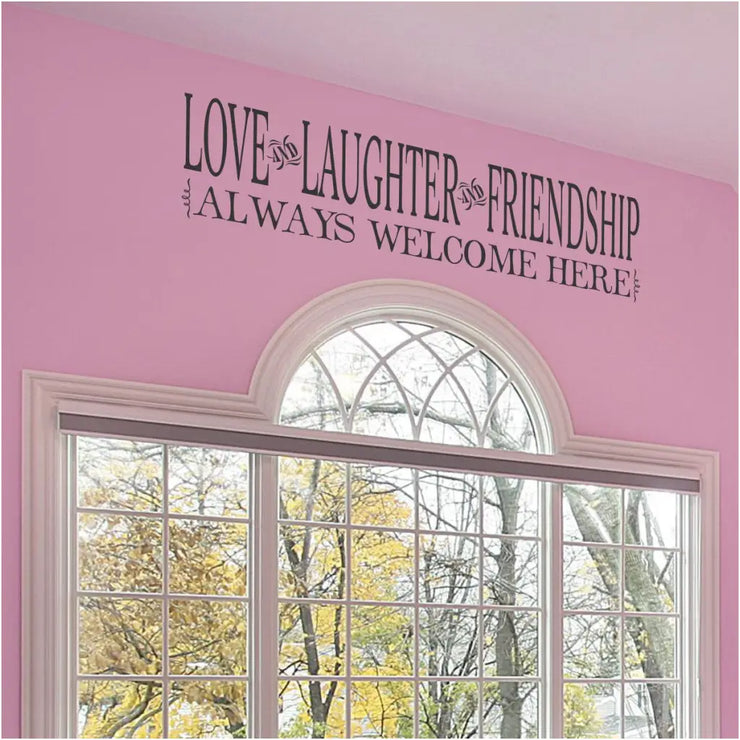 Love and laughter and friendship always welcome here. A beautiful wall decal by The Simple Stencil to display in an entryway or family room. 