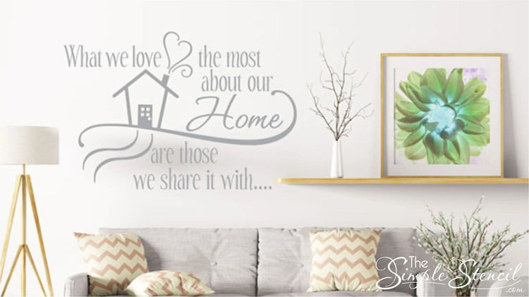 Beautiful living room decor with vinyl decal art to welcome guests into home, welcoming quote for guests by The Simple Stencil